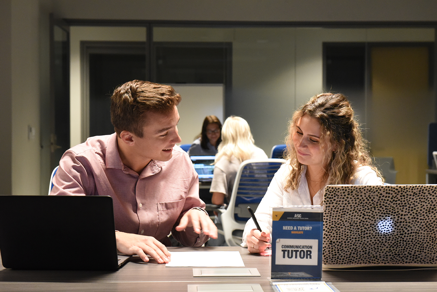 Tutor helping a student