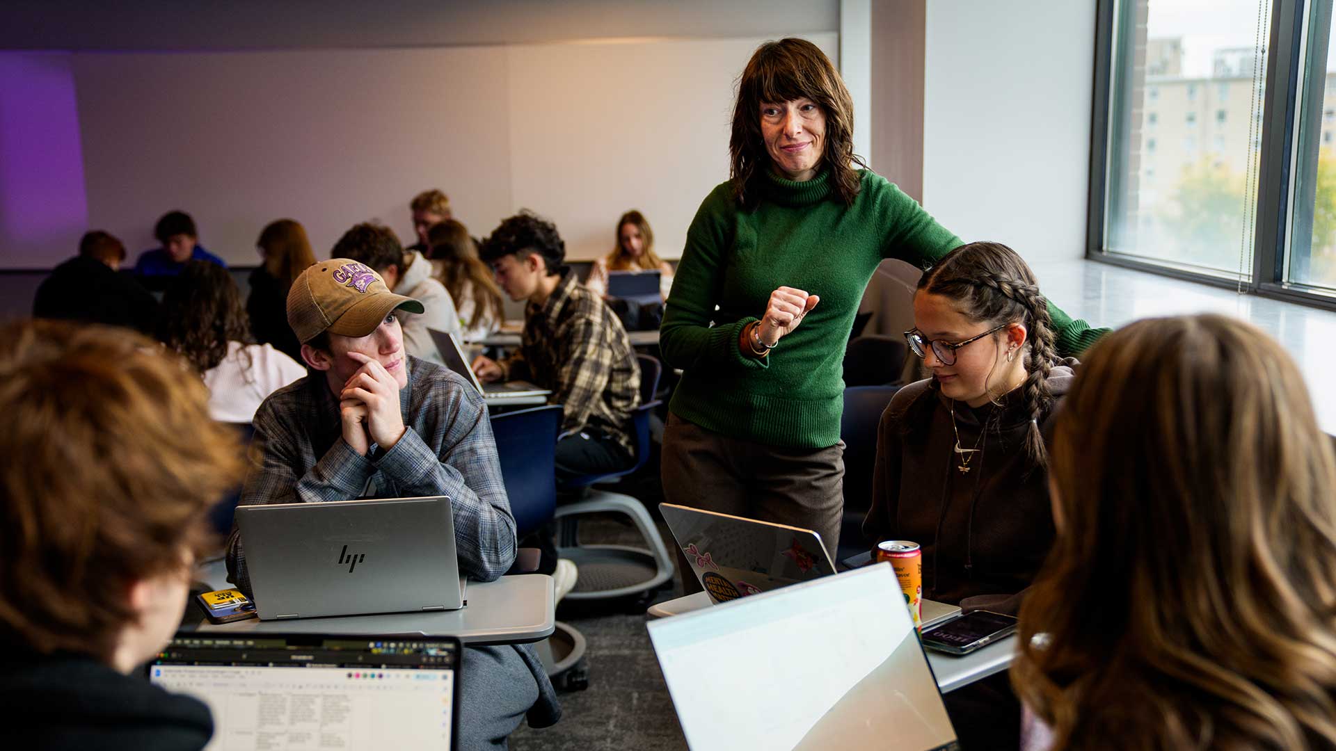 Faculty member Sarah Morris teaches an English 101 class in Hodges Hall
