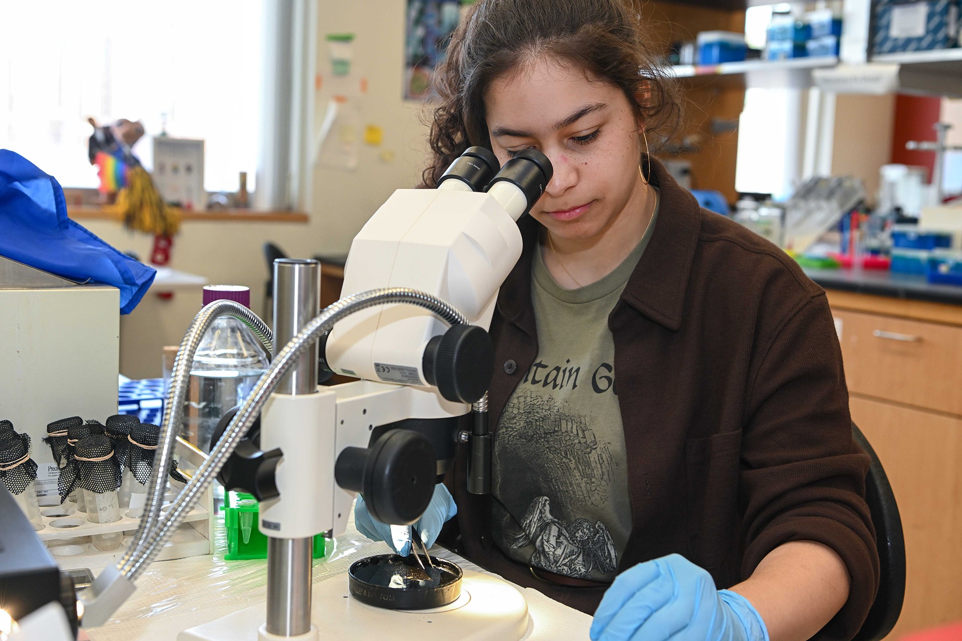 Student at microscope