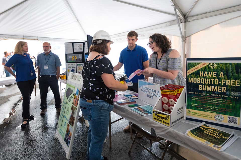 People visiting tables at the Fort Martin Health Fair