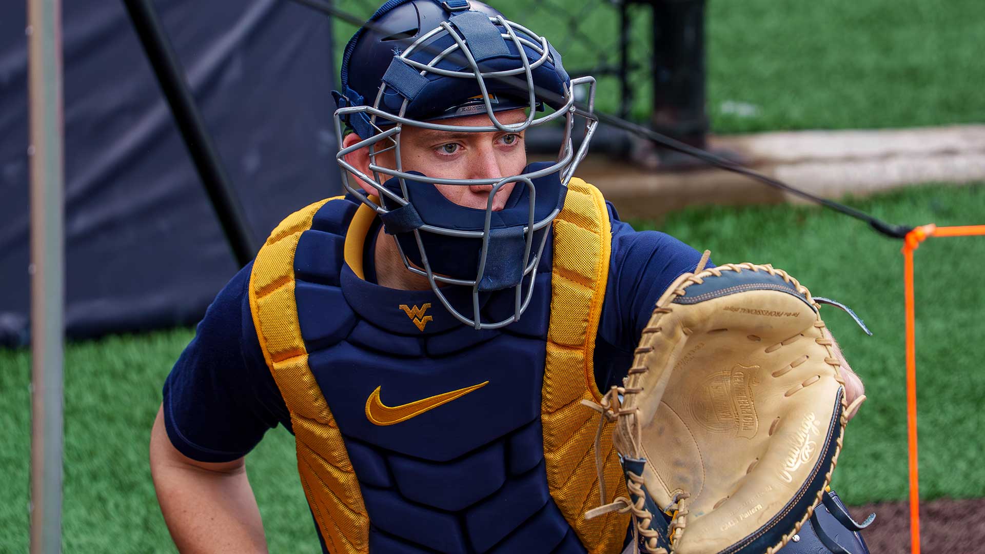 Nicholas Menarchek catches pitches in the bullpen