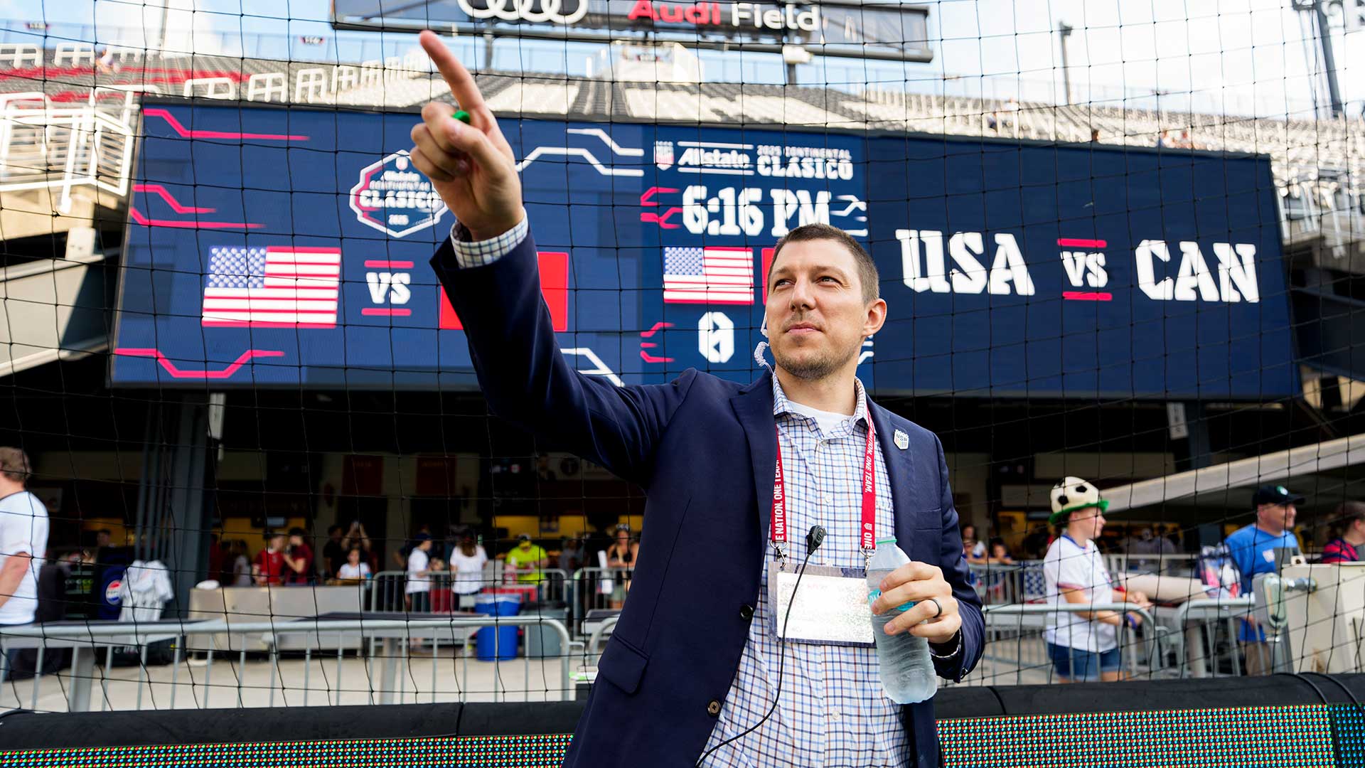 John Terry points to the crowd at a USA-CAN soccer game