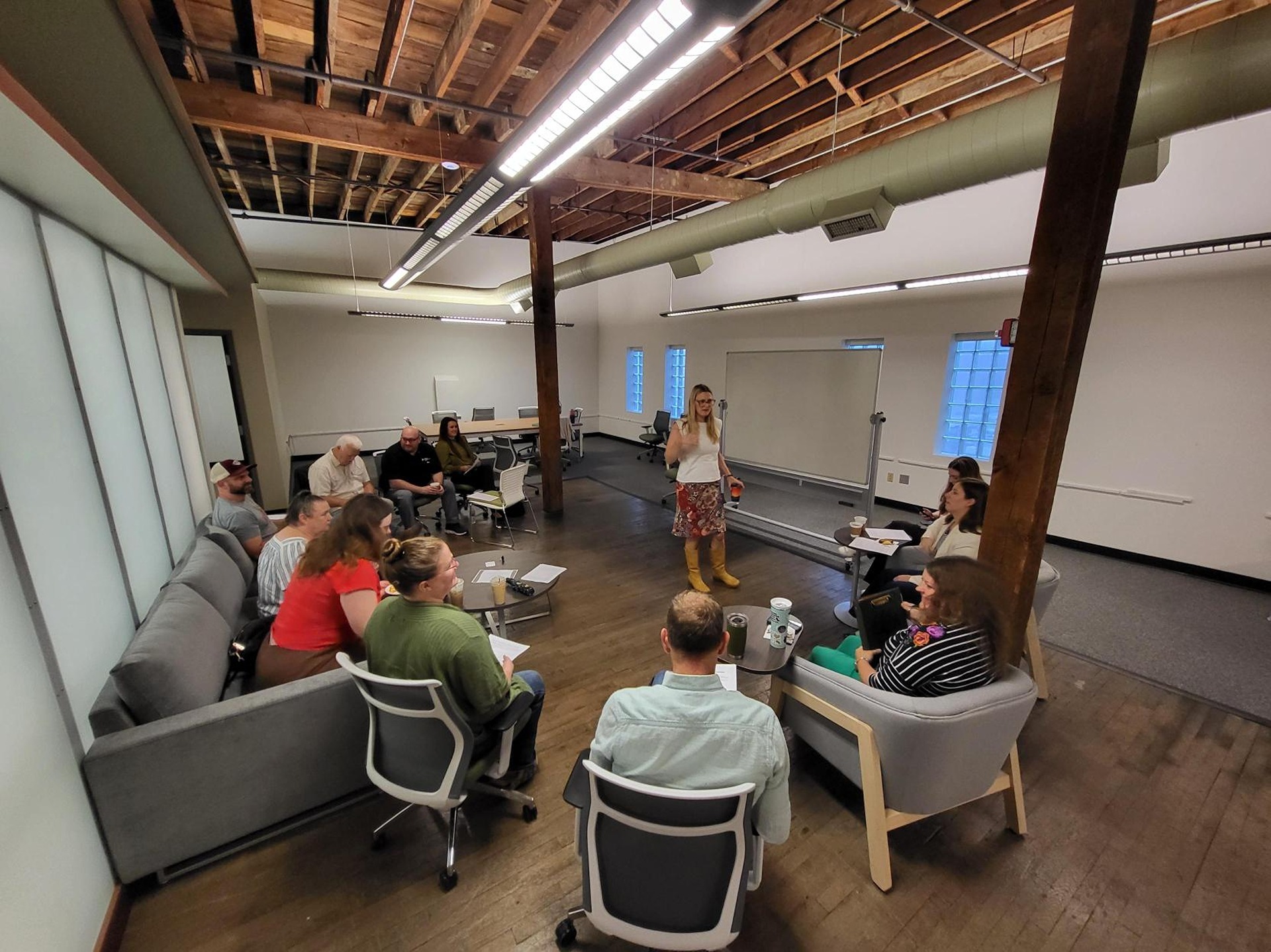 Outdoor business development participants take part in a small-group workshop.