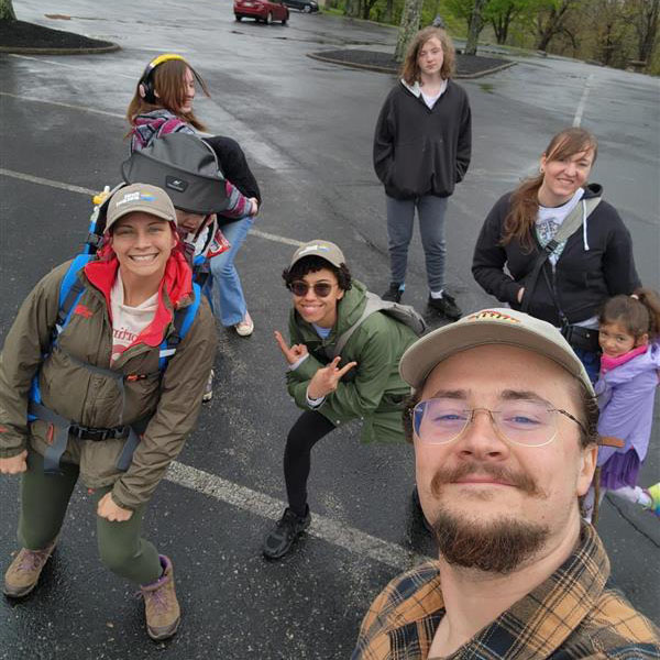 First Ascent members and their families pose for a group selfie before an outdoor outing.