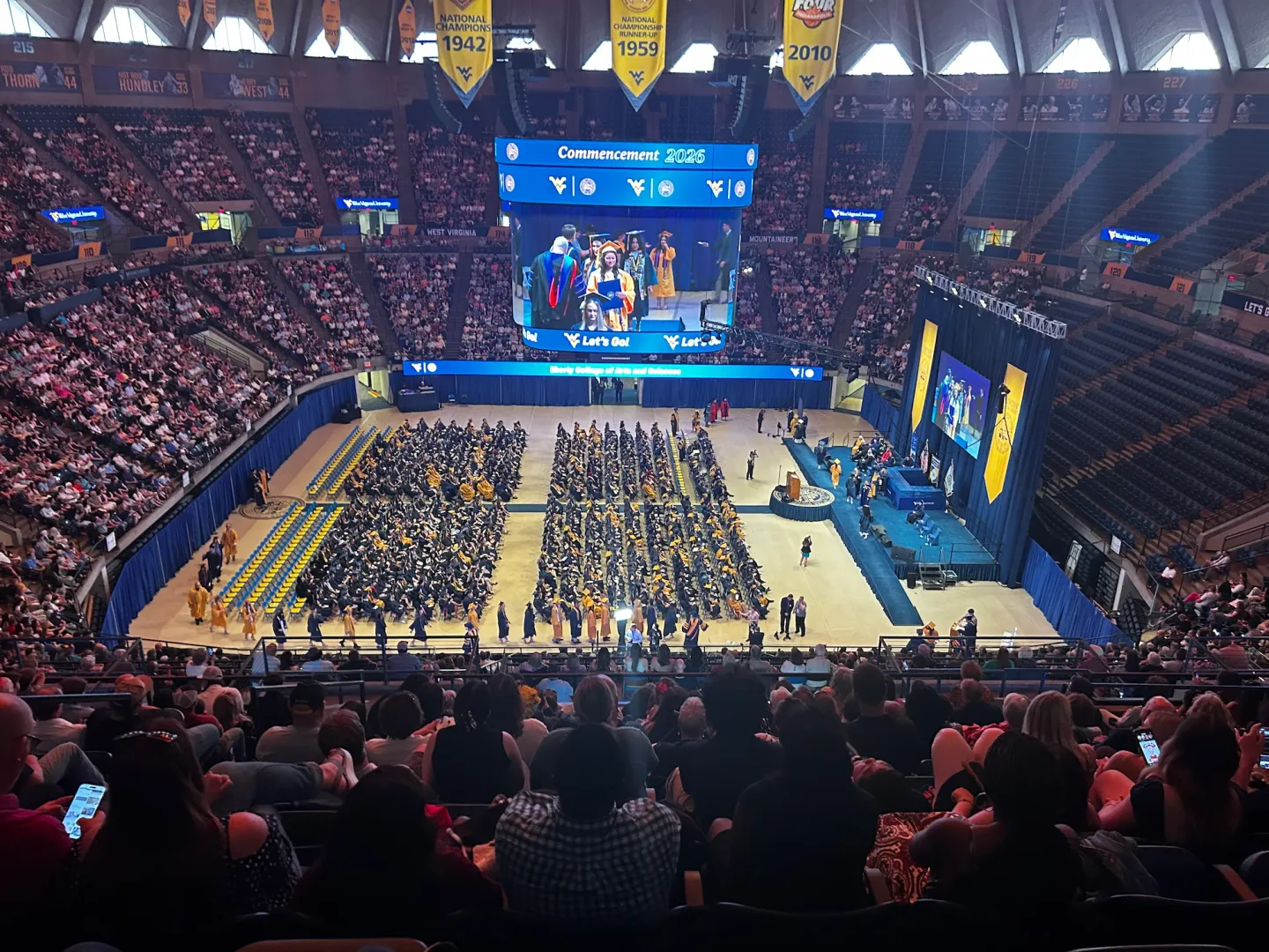 A full house at the WVU Colosseum for the Eberly College of Arts & Sciences Commencement Ceremony 2026